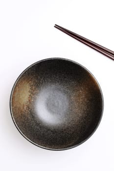 rice bowl and chopsticks on white background