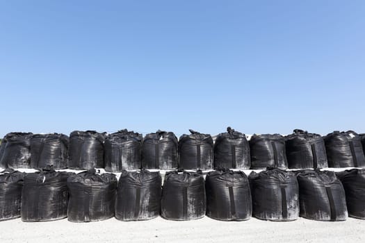 stack of toxic substance bag