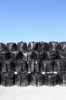 stack of toxic substance bag
