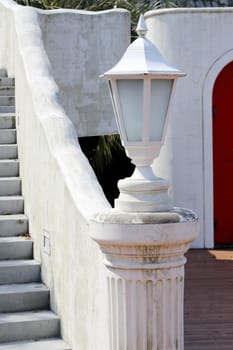 White garden lamp, lamp in a garden