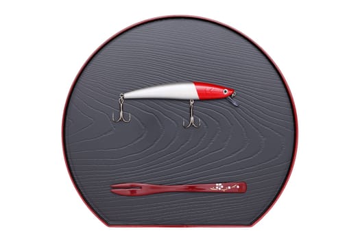 Plastic fishing lure on tray