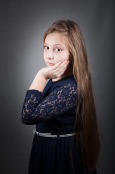 Portrait of a 10 year old girl, studio shot.