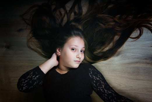 Portrait of a 10 year old girl, studio shot.