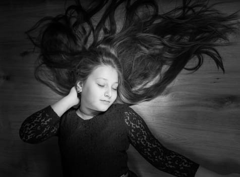 Portrait of a 10 year old girl, studio shot.