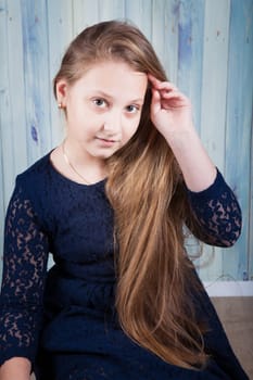 Portrait of a 10 year old girl, studio shot.