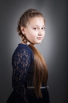 Portrait of a 10 year old girl, studio shot.