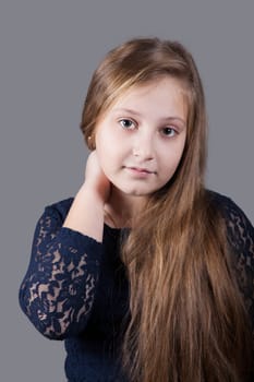 Portrait of a 10 year old girl, studio shot.