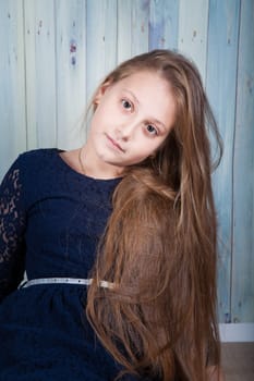 Portrait of a 10 year old girl, studio shot.