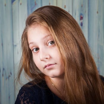 Portrait of a 10 year old girl, studio shot.