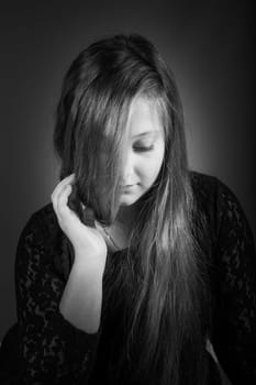 Portrait of a 10 year old girl, studio shot.