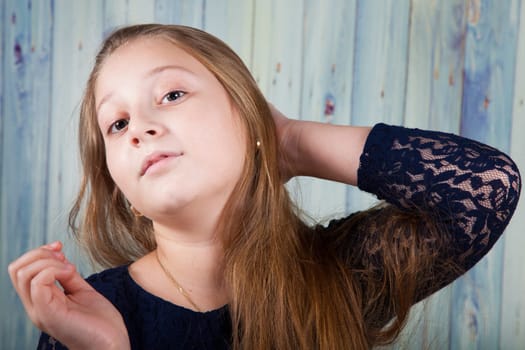 Portrait of a 10 year old girl, studio shot.