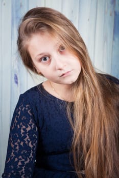 Portrait of a 10 year old girl, studio shot.