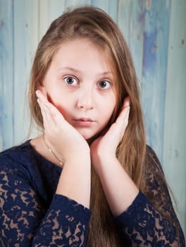Portrait of a 10 year old girl, studio shot.