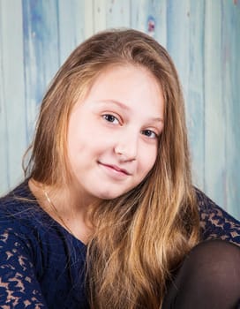 Portrait of a 10 year old girl, studio shot.