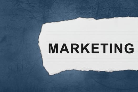 marketing with white paper tears on blue texture