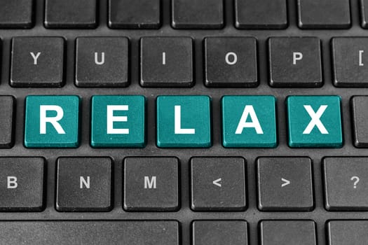 relax turquoise word on keyboard