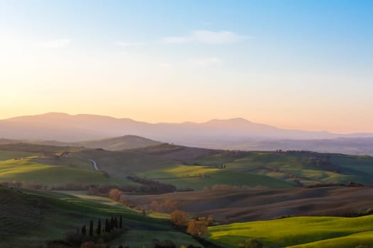 A sunrise in the Tuscan countryside in spring