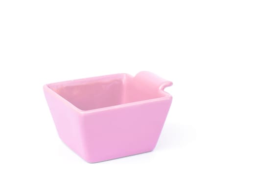 Pink ceramic bowl isolated on white background, stock photo