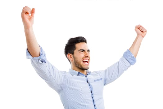 Successful young man with arms open, isolated over white background