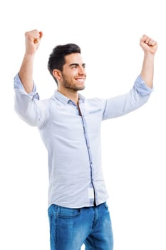 Successful young man with arms open, isolated over white background