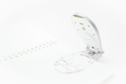 Light reading lamp clip on the paper , stock photo