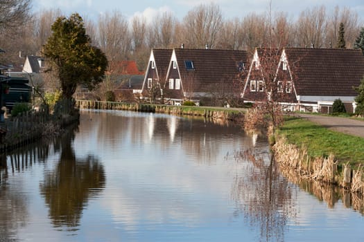 In the Netherlands most people are living below sea level. This is a canal in Nieuwerkerk aan den IJssel. The city where you can find the lowest point of the Netherlands