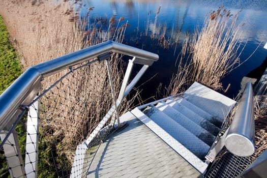 Staircase to a natural pool in Rotterdam, the Netherlands