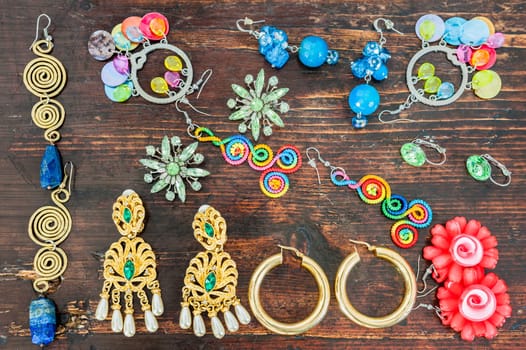 Women's jewellery. Various types of earrings very colourful.