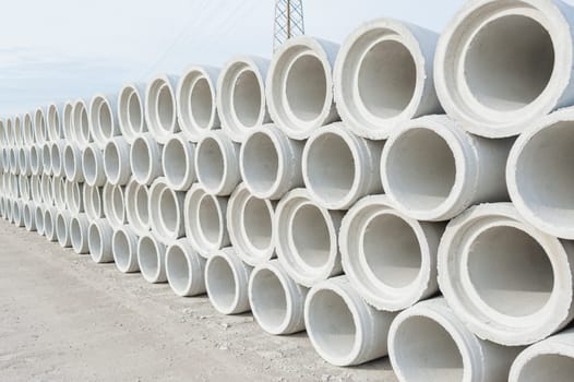 Concrete drainage pipes for industrial building construction.