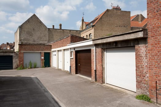 Garage doors at the backside of the houses in Bergues, France