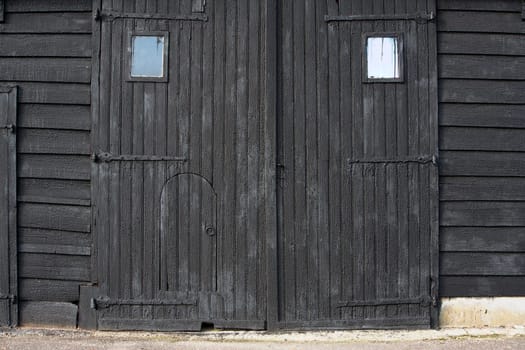 Small door in a big barn door