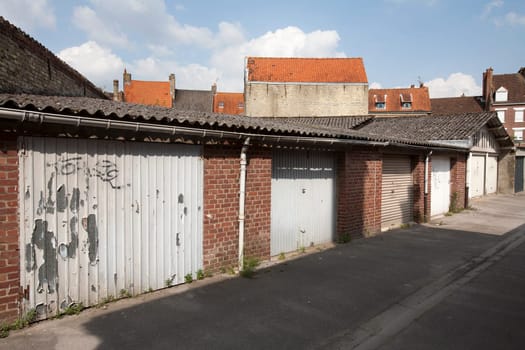 Garage doors at the backside of the houses in Bergues, France
