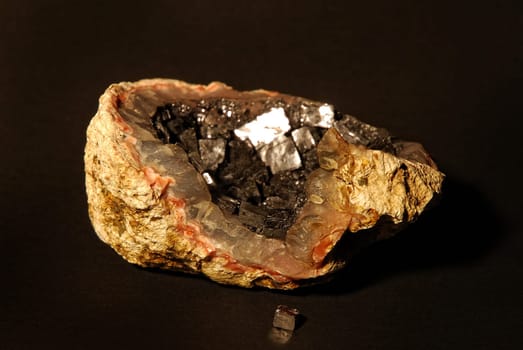 Pyrite stone on a dark background