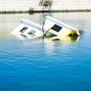 Shipwreck at the pier. harbor of Cagliari - Sardinia.