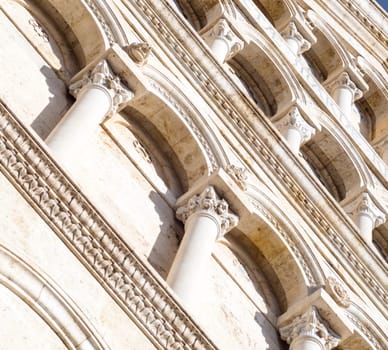 cathedral Marble geometric. Many columns lined on the cathedral facade