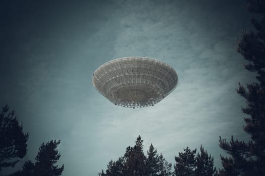 An unidentified flying object hovering in the sky above trees