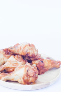 Grilled chicken wings isolated on white background, stock photo