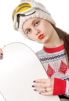 a beautiful woman with a snowboard in studio