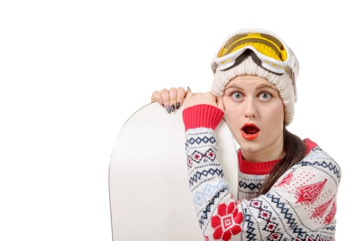 a beautiful woman with a snowboard in studio