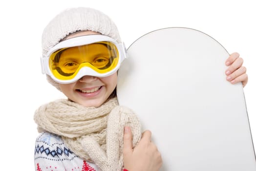 a pretty young girl with a snowboard in studio