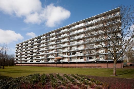 Apartment block from the seventies in a green environment.