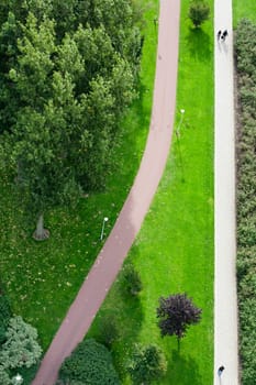 Aerial view of a footpath and bicycle path in a green environment
