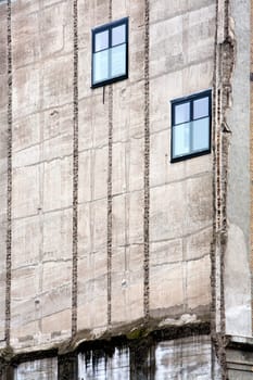 Old Concrete wall with two new windows