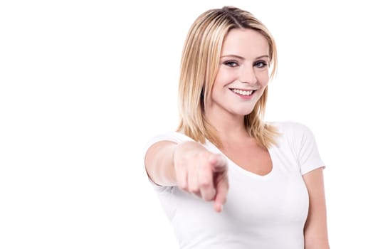 woman pointing her index finger towards camera