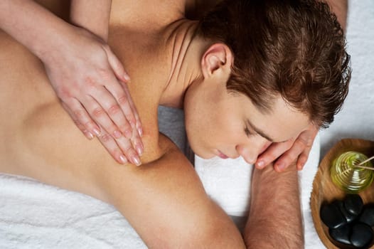 Back massage for a young man at sap center