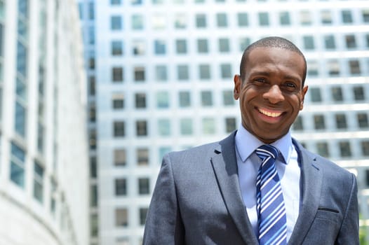 Picture of a business man outside his office