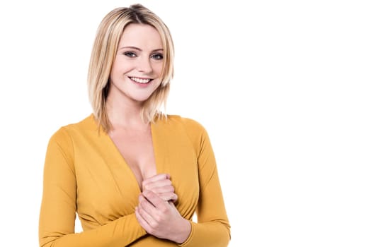 Smiling woman posing to camera in trendy costume
