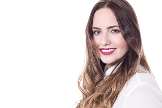 Beautiful woman posing to the camera against white