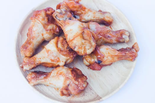 Grilled chicken wings isolated on white background, stock photo