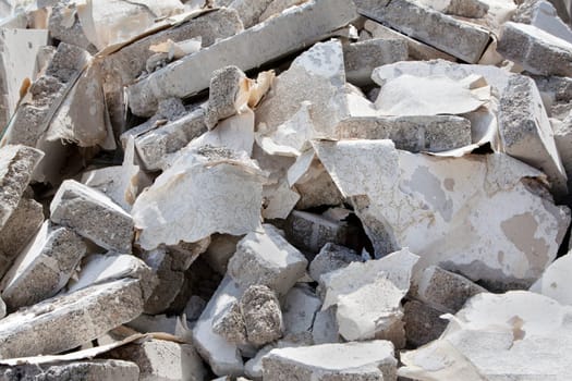 A heap of bricks and stones on a construction site